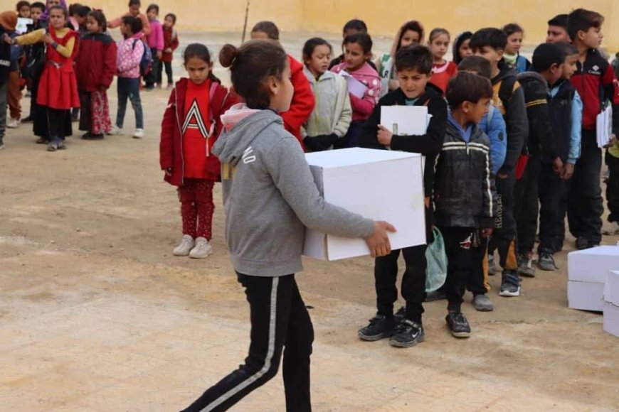 DAA distributes winter clothes to primary school students in Deir ez-Zor