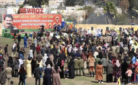 Mothers of Peace in Tabqa light Nowroz flame