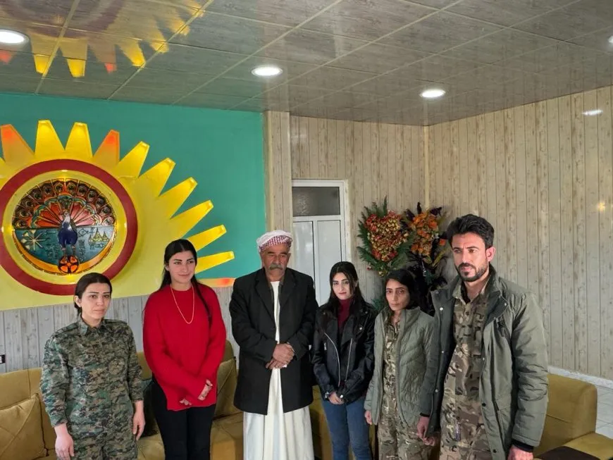 Yazidi home returns young woman, Kofan, to her family