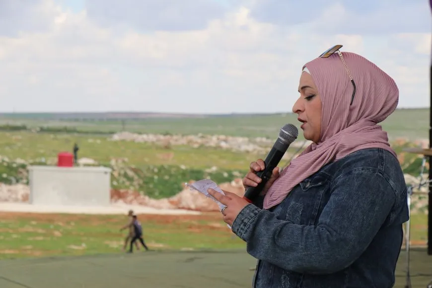 Calls for leader physical freedom during March 8 event in Aleppo