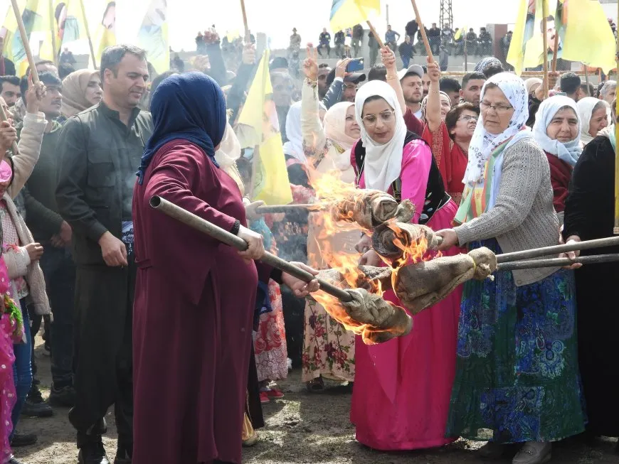 Mothers of Peace in Tabqa light Nowroz flame