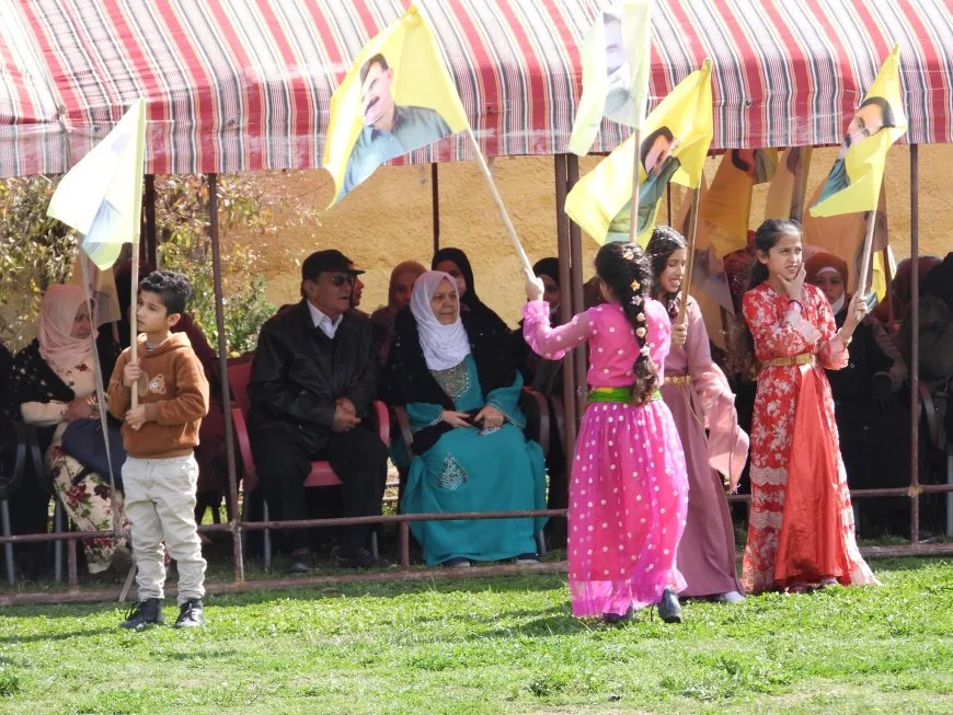 Mothers of Peace in Tabqa light Nowroz flame