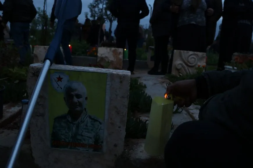 On the eve of Eid al-Fitr, candles are lit on martyrs' shrines 