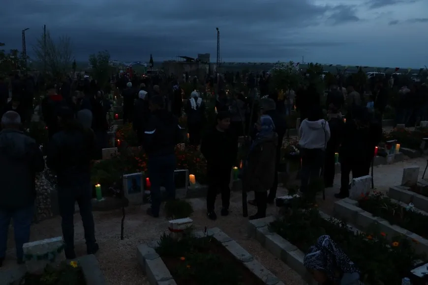 On the eve of Eid al-Fitr, candles are lit on martyrs' shrines 