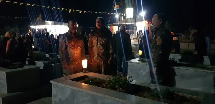 On the eve of Eid al-Fitr, candles are lit on martyrs' shrines 