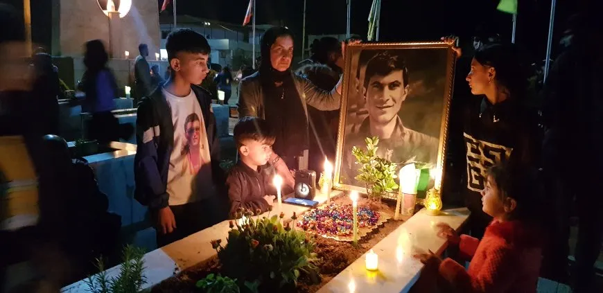On the eve of Eid al-Fitr, candles are lit on martyrs' shrines 