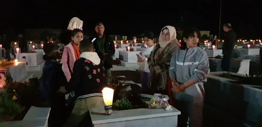 On the eve of Eid al-Fitr, candles are lit on martyrs' shrines 