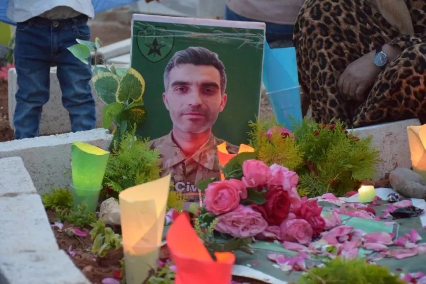 On Martyrs' Day eve people of NE Syria light candles on their shrines