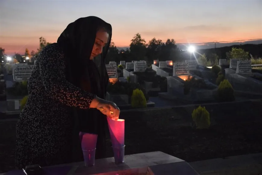 On Martyrs' Day eve people of NE Syria light candles on their shrines