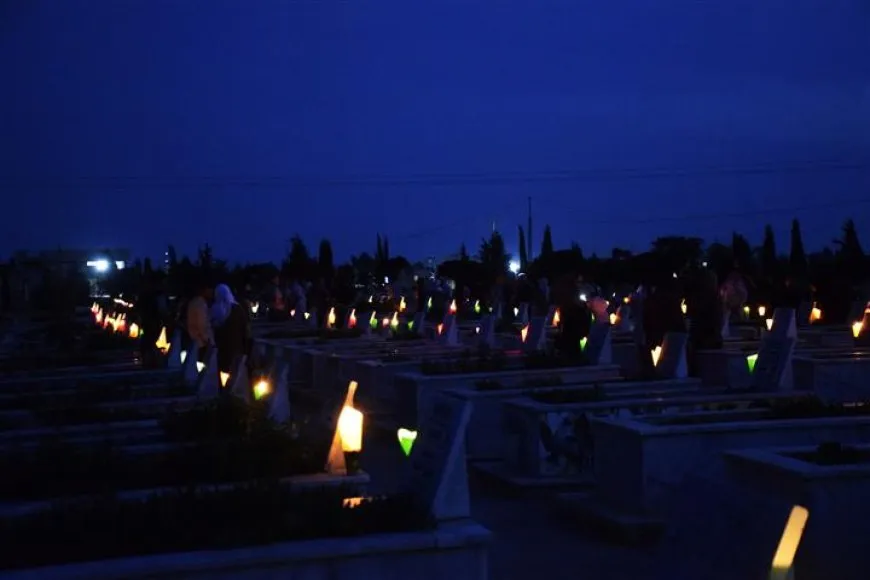 On Martyrs' Day eve people of NE Syria light candles on their shrines