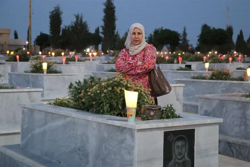 On Martyrs' Day eve people of NE Syria light candles on their shrines