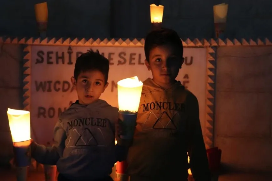 On Martyrs' Day eve people of NE Syria light candles on their shrines