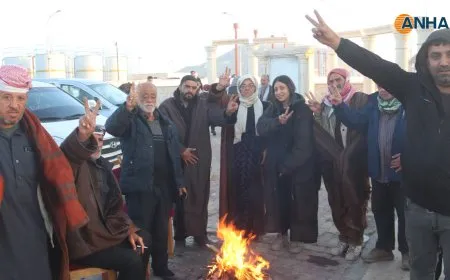 In high spirits, they continue their shift on Tishreen Dam