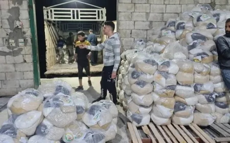 Kurdish Red Crescent distributes aid to affected families in coast