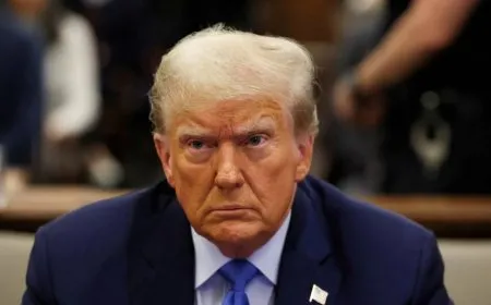 Trump signs order to reduce sanctions on Syria