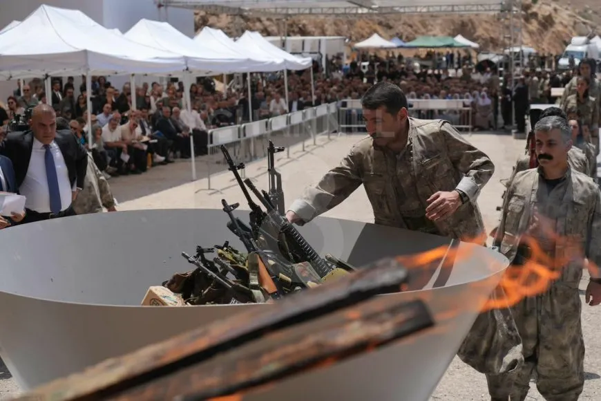 Guerrilla forces symbolically destroy weapons, shift to political struggle following Leader Ocalan's call