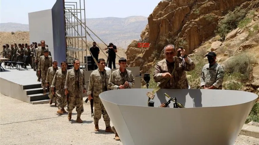 Scenes of Guerrillas destroying weapons in response to Leader Ocalan’s call