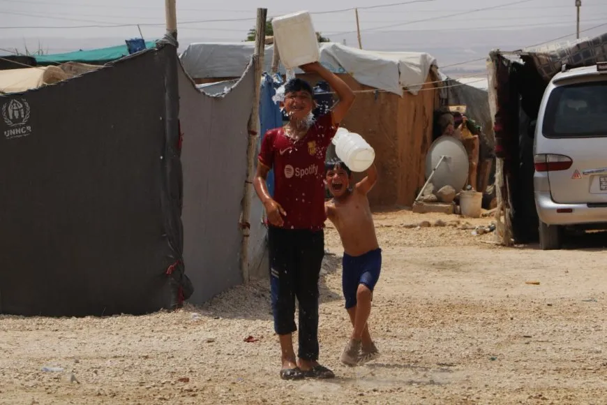 Children of Washokani Camp suffer under displacement, July's heat