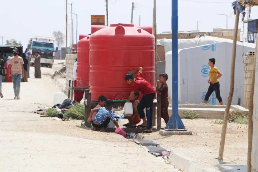 Children of Washokani Camp suffer under displacement, July's heat