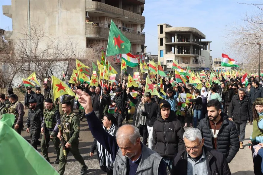 Thousands of voices in Jazira chant, "Long live Rojava resistance"