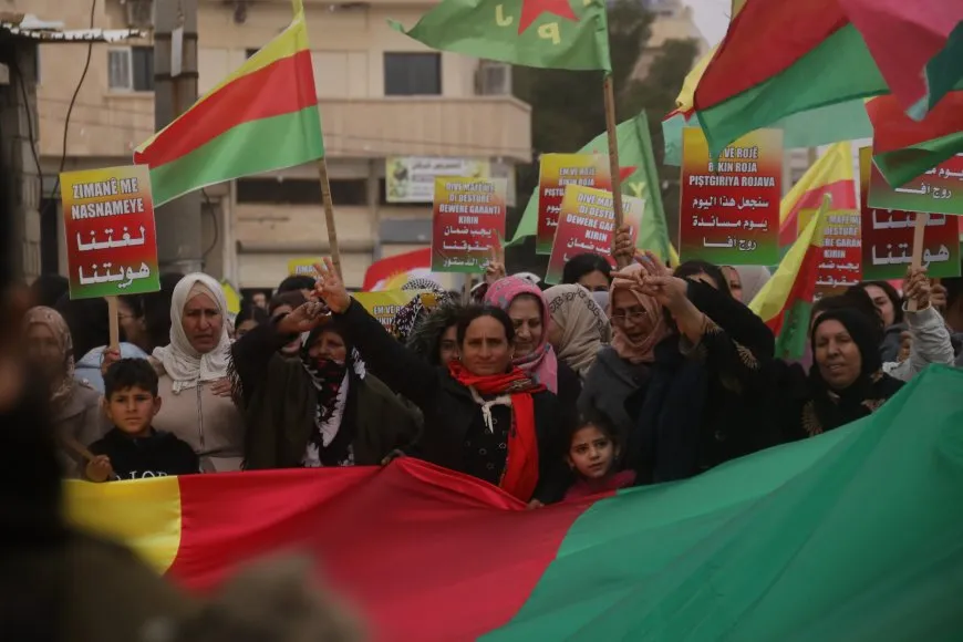 Thousands of voices in Jazira chant, "Long live Rojava resistance"