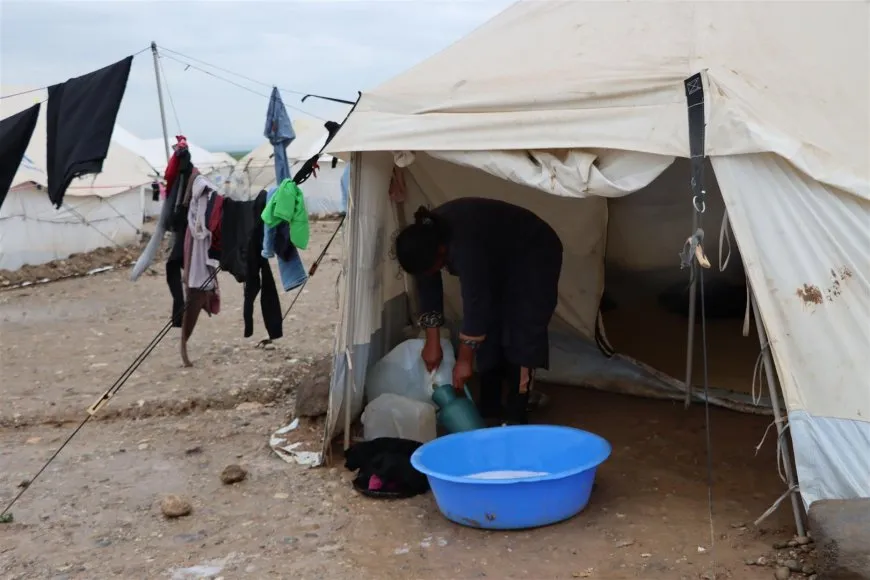 Rainwater leaks into tents of IDPs in Newroz Camp in Derik