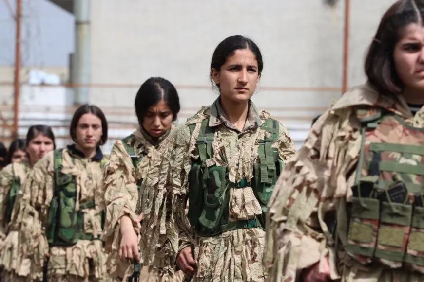 YPJ salutes leader's birthday, its founding anniversary with military parade