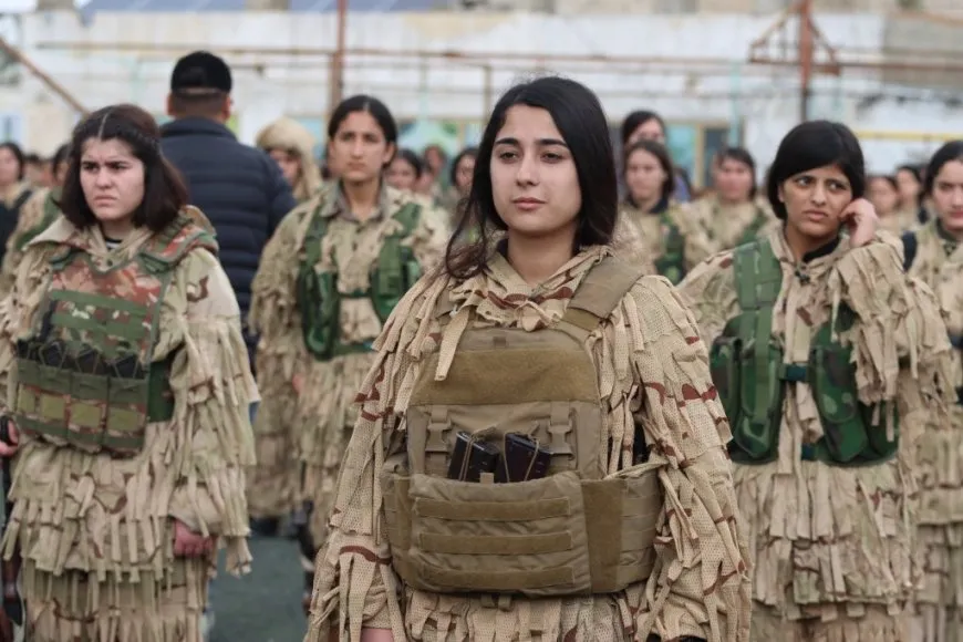 YPJ salutes leader's birthday, its founding anniversary with military parade