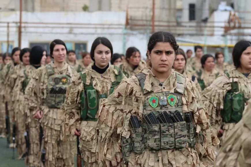 YPJ salutes leader's birthday, its founding anniversary with military parade