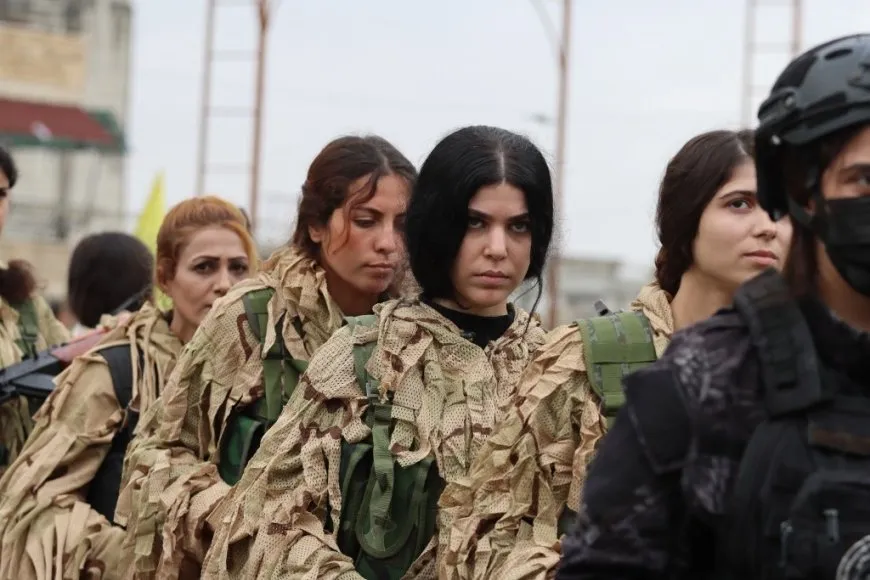 YPJ salutes leader's birthday, its founding anniversary with military parade