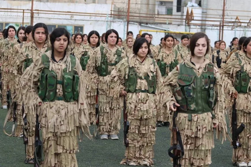 YPJ salutes leader's birthday, its founding anniversary with military parade
