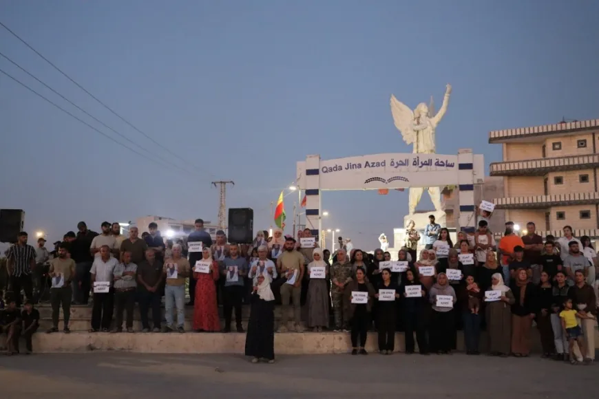 Residents of Kobani rally over violations in Tal Hasel, Tal Aran