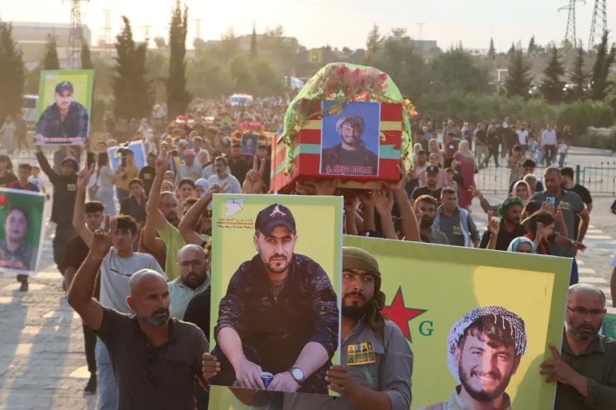 Eight SDF fighters laid to rest in Kobani
