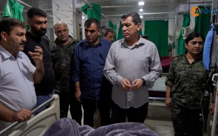 Mazloum Abdi visits injured victims of Kobani Prison Fire