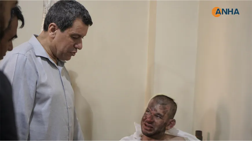 Mazloum Abdi visits injured victims of Kobani Prison Fire