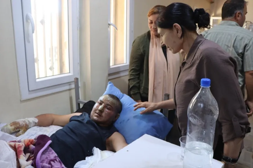Kobani Administration visits victims of prison fire