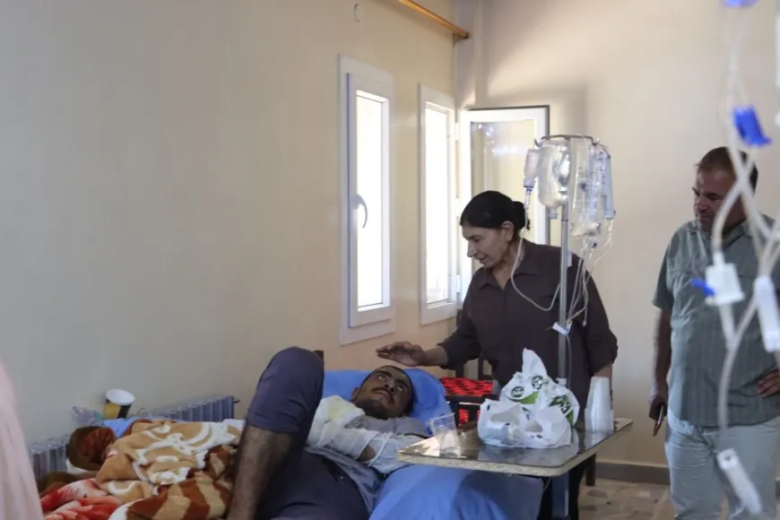 Kobani Administration visits victims of prison fire