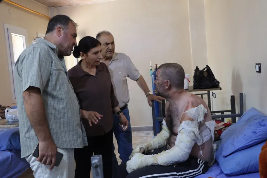 Kobani Administration visits victims of prison fire