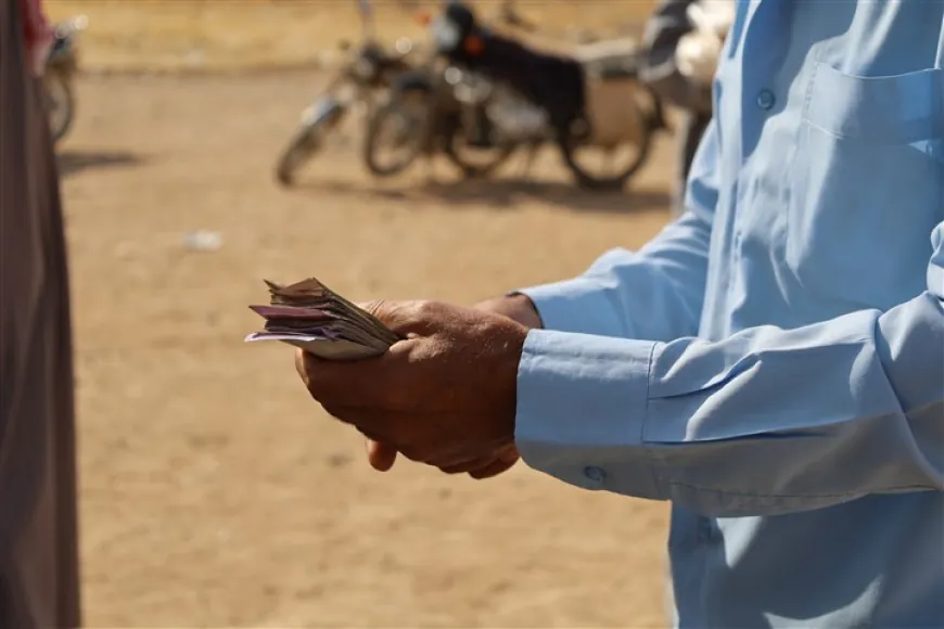 Humanitarian initiative in Tal Tamr helps residents exchange currency to buy bread