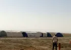 Residents of Said al-Darbo village set up tents after being prevented from returning home
