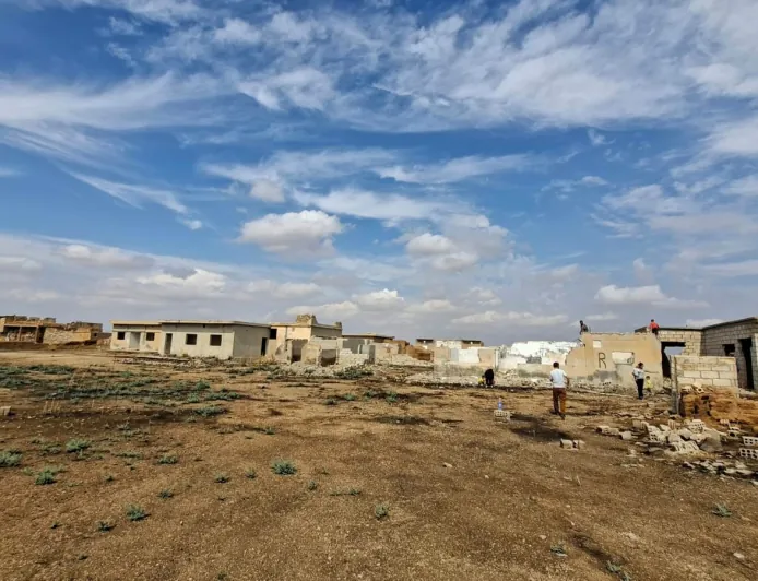 Residents of Hweisha inspect their homes and assess destruction after displacement