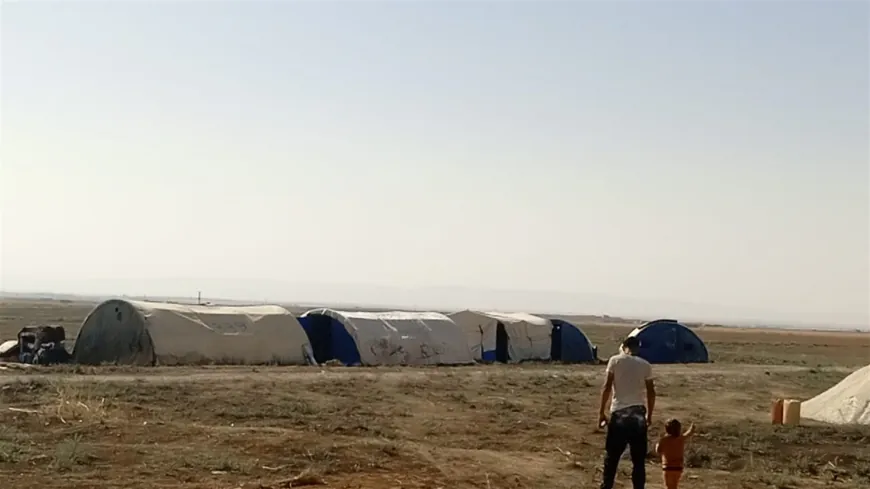 Residents of Said al-Darbo village set up tents after being prevented from returning home