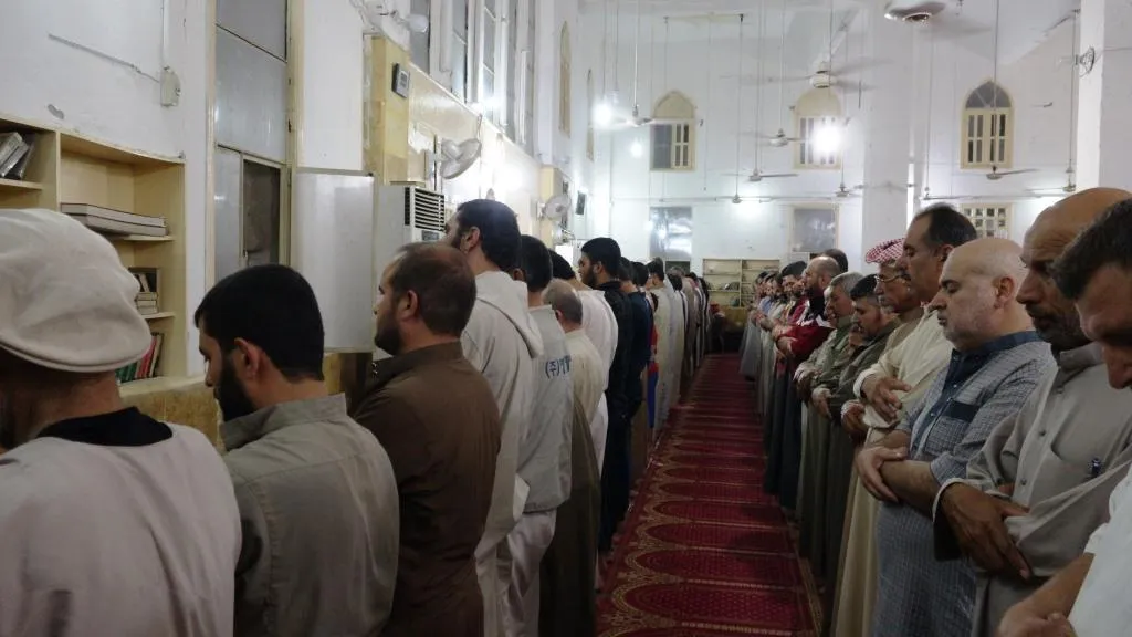 Pueblo del barrio al-Shiekh Maksoud y de la ciudad de al-Raqq celebran noche del destino