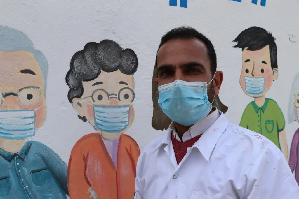 ​​​​​​​Pintura para crear conciencia contra la pandemia de la Corona en Manbij