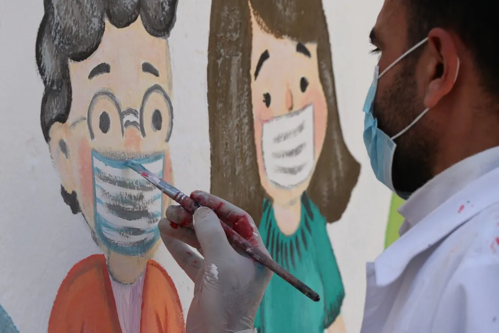 ​​​​​​​Pintura para crear conciencia contra la pandemia de la Corona en Manbij