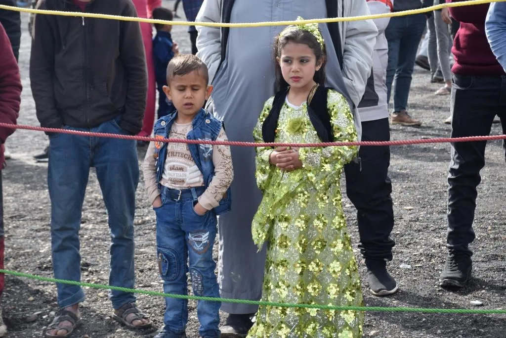 La gente del norte y este de Siria acude a las plazas de Newroz