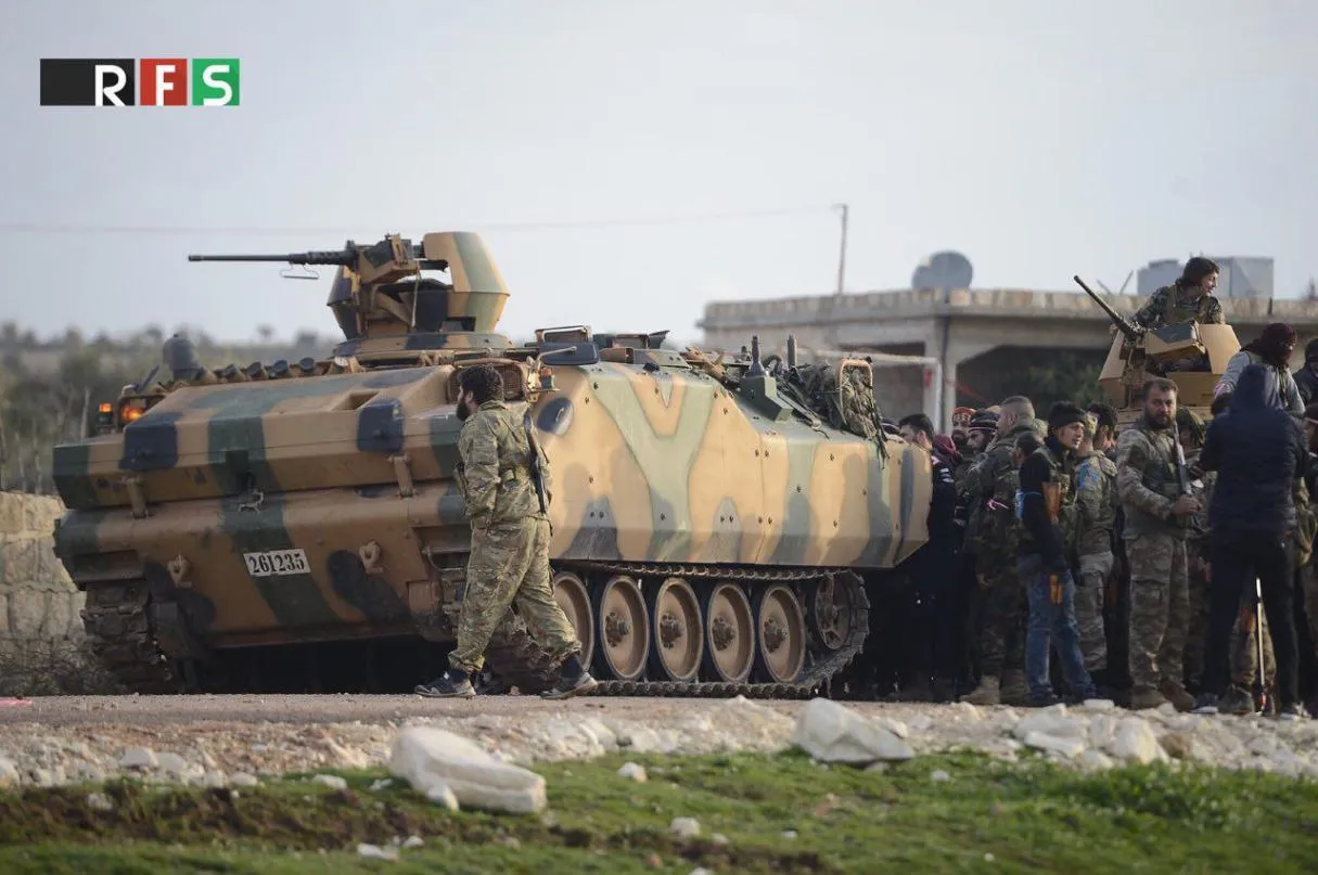 Çete li Efrînê li ser parvekirina milkên sivîlan şer dikin