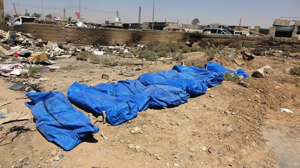 Li Reqayê goreke komî ya çeteyên DAIŞ`ê hate dîtin