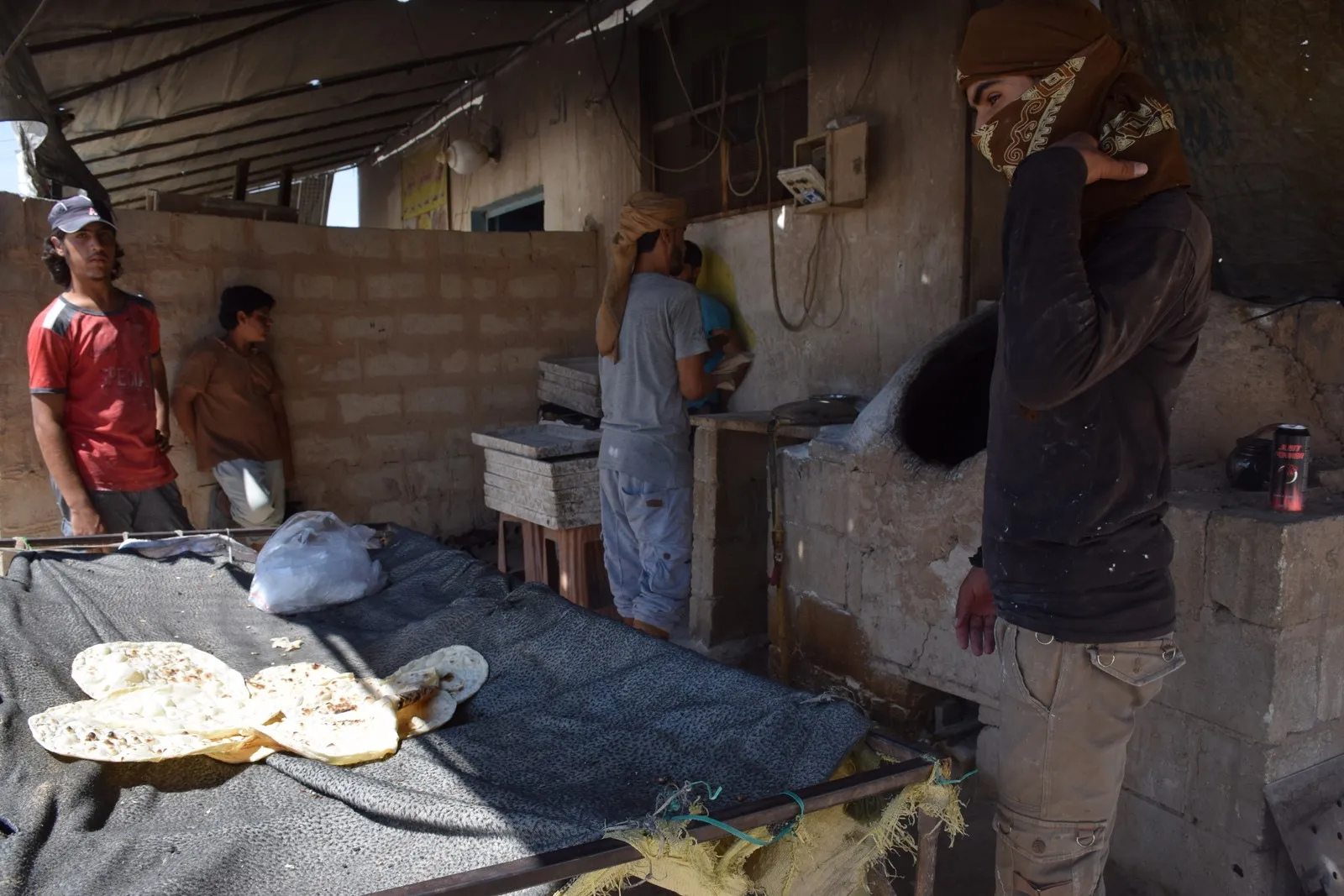 Aliyek ji jiyana penaberên kampa Holê bi wêne û dîmen