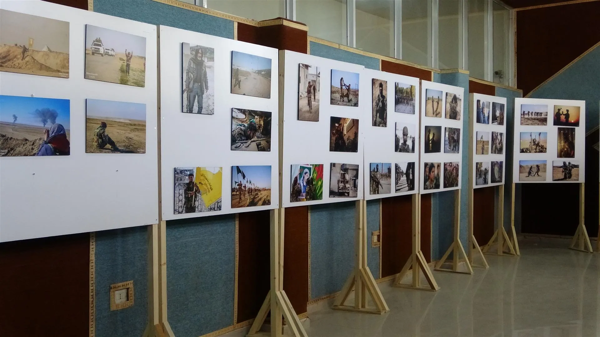 Navenda Şopdarên Rojê pêşangeheke wêneyan vekir